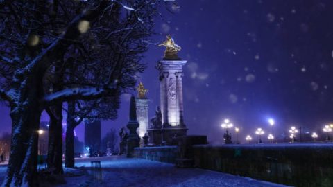 Bridge Pont Alexandre III columns during night under snow winter, Paris, France